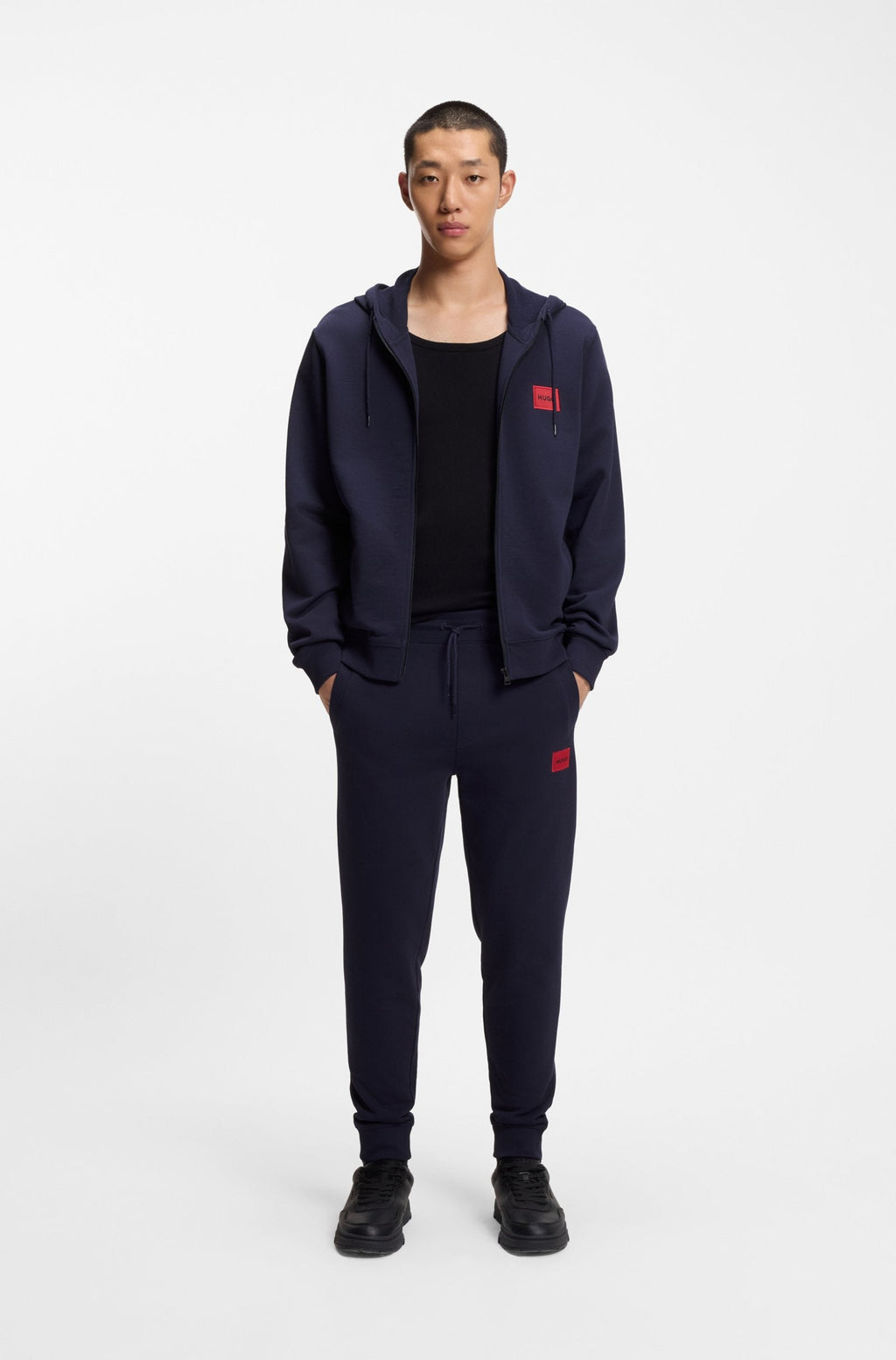 Prenda con capucha de felpa de algodón con cremallera y etiqueta con logo